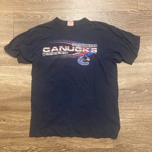 CANUCKS vintage t shirt.  Size small Vancouver hockey shirt
